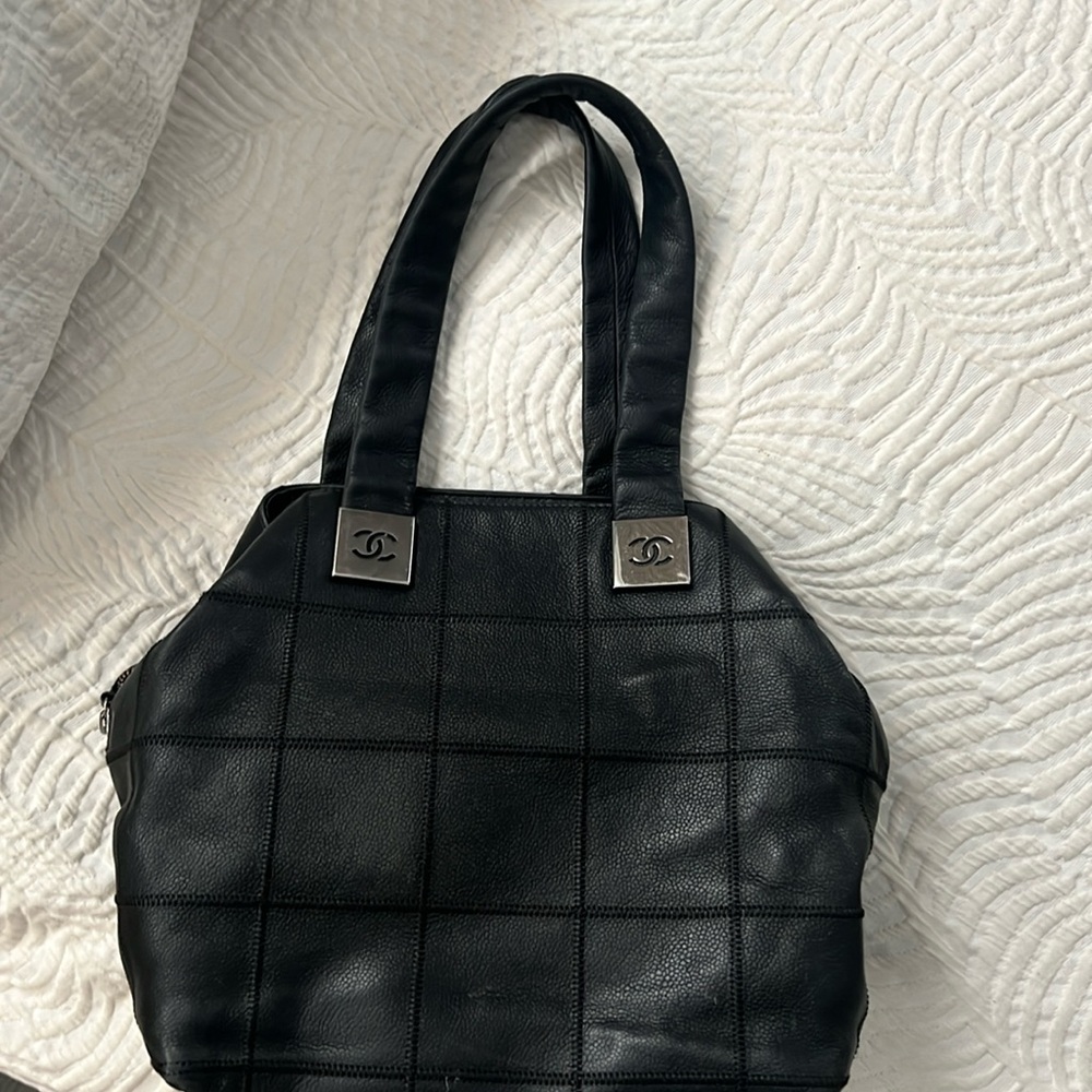 Chanel quilted bag designed by Karl Lagerfield. Very unique bad